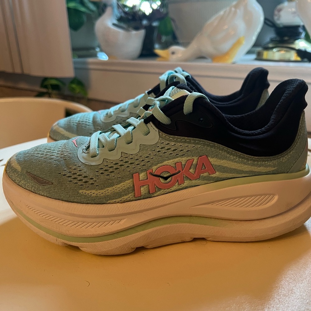 Hoka Aqua and Black Athletic Shoes